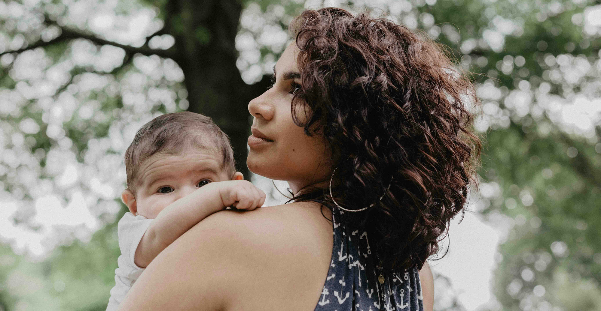 mom holding baby
